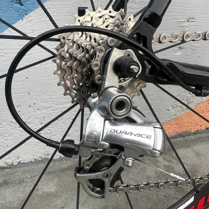 Close-up of a bicycle gear system on Cervelo Dual with 'Dura-Ace' branding